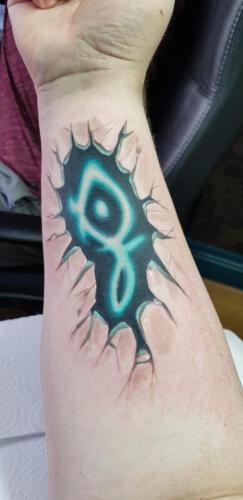 Summoning dark. Picture taken from the Facebook group Discworld tattoos.