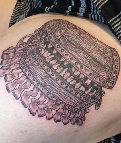 The Luggage. Picture taken from the Facebook group Discworld tattoos.